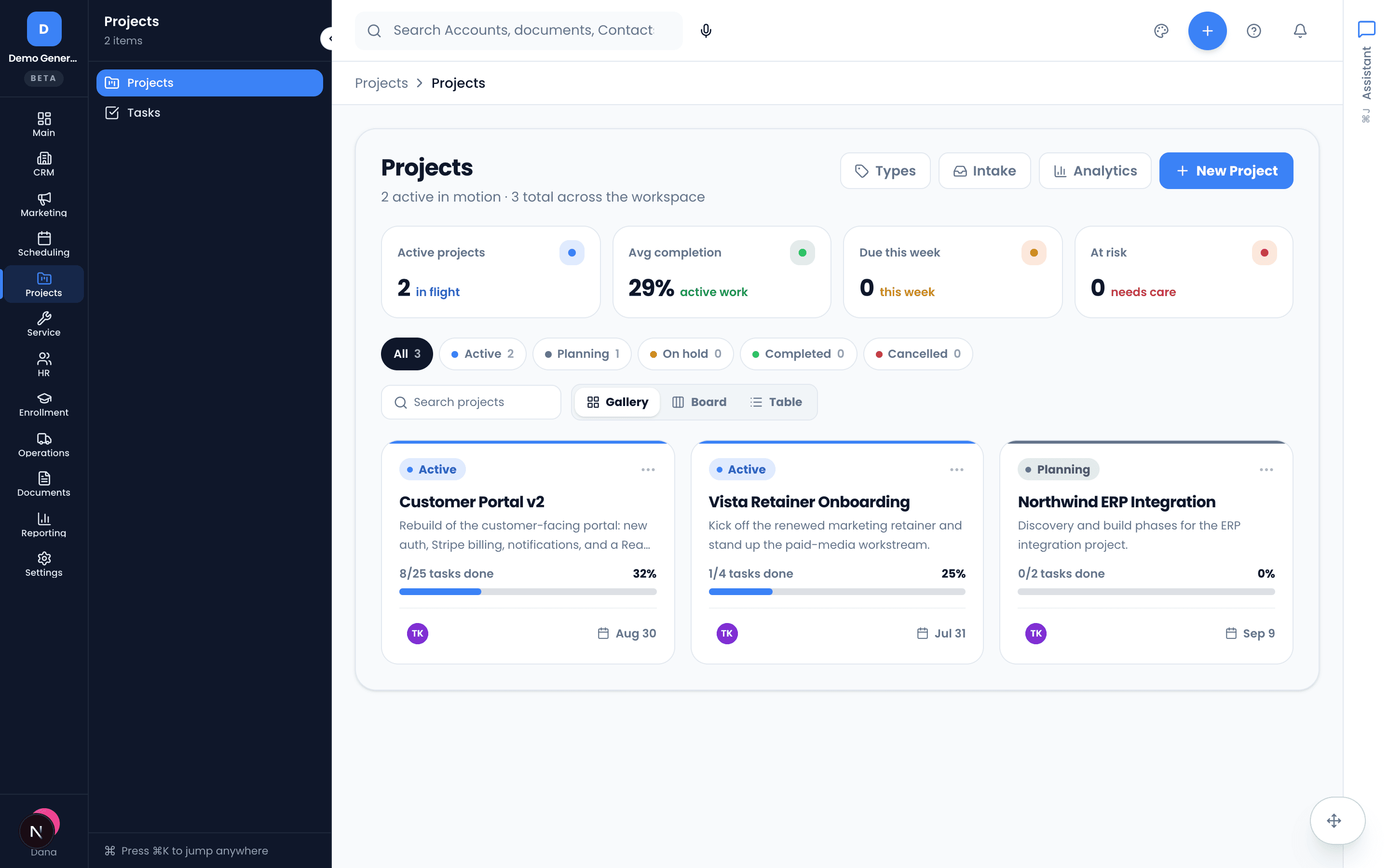 The Projects portfolio — active/at-risk stat tiles above project cards showing status, percent complete, task counts, and due date.