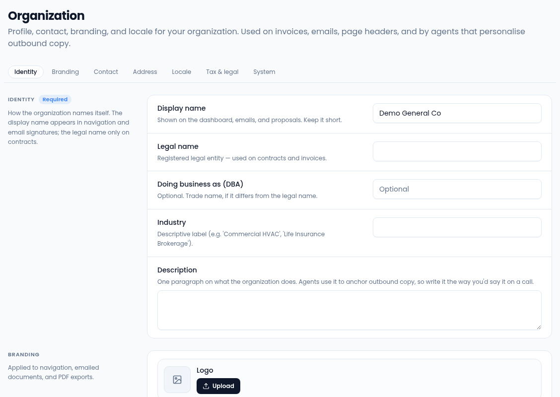 The Organization page with jump links to Identity, Branding, Contact, Address, Locale, Tax & legal and System, and the Identity section marked Required with Display name Demo General Co and empty Legal name, Doing business as (DBA), Industry and Description fields, then the start of the Branding section with a Logo upload.